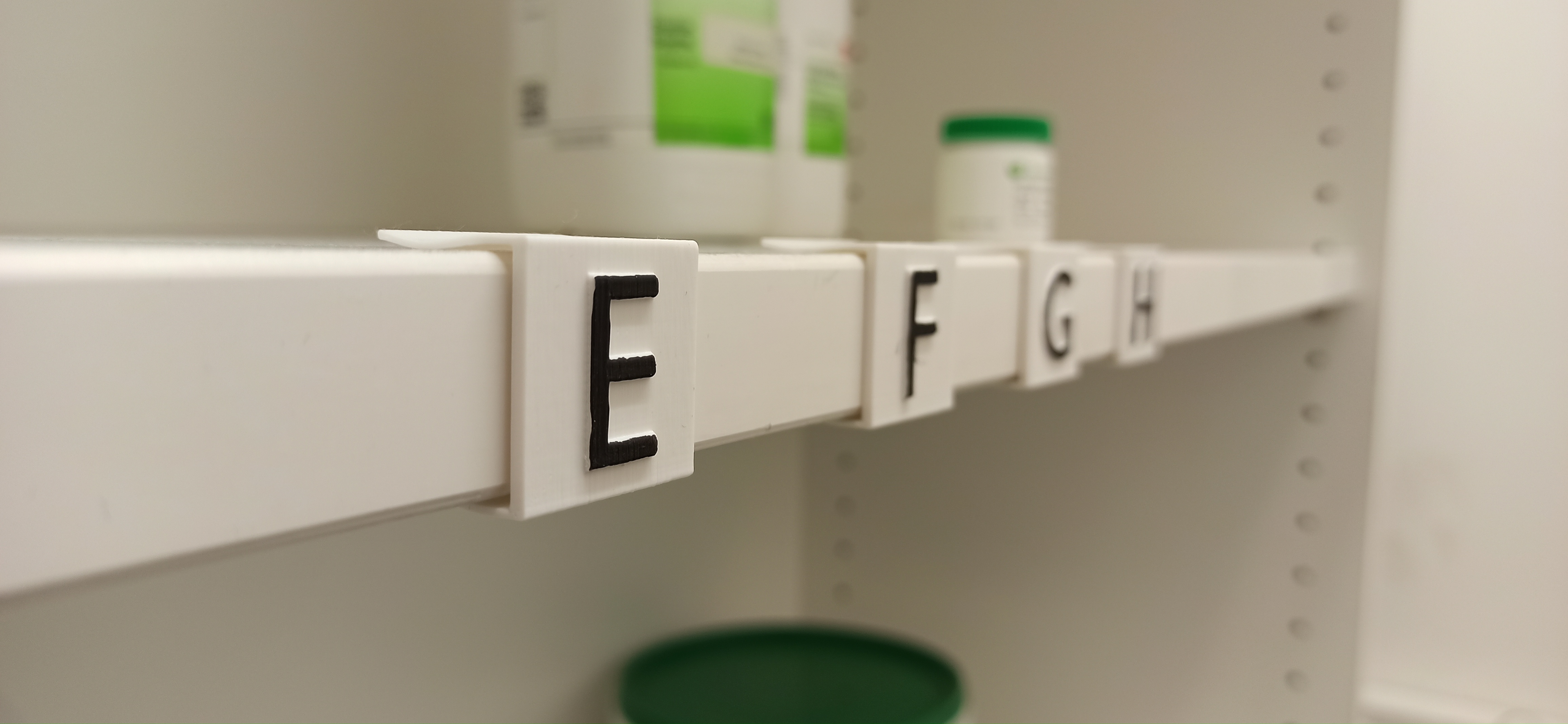 Alphabetic shelf plaques