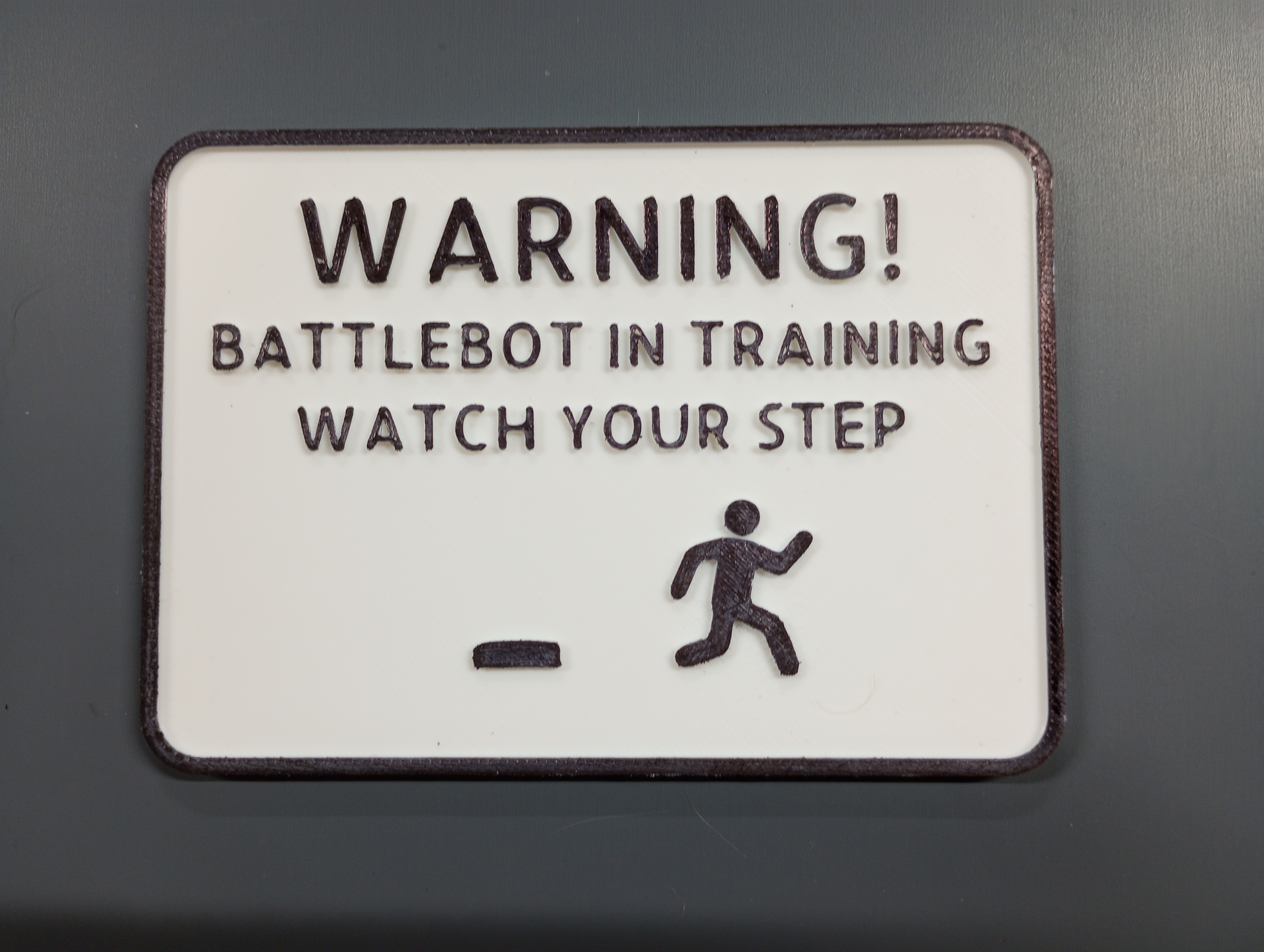 Battlebot in Training Warning Sign for Robot Vacuum Cleaners