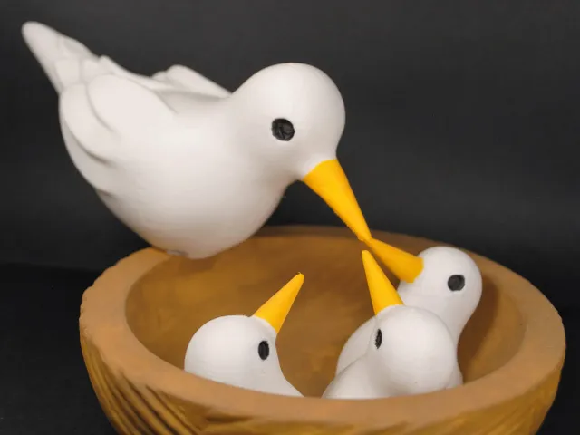 Bird mother with little ones