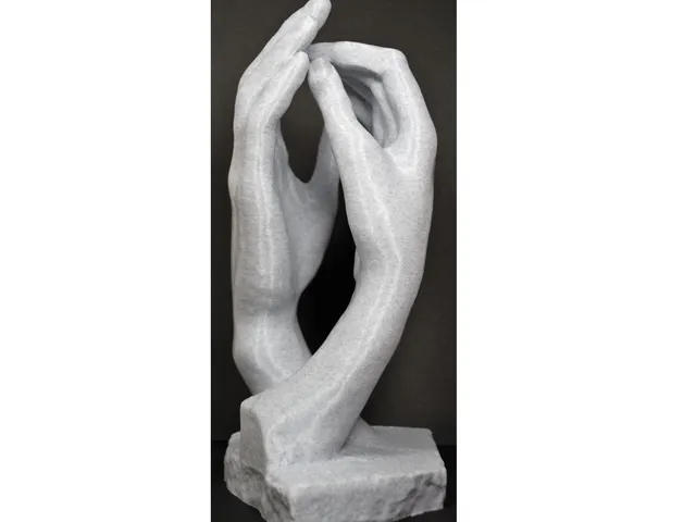 Hand of lovers sculpture