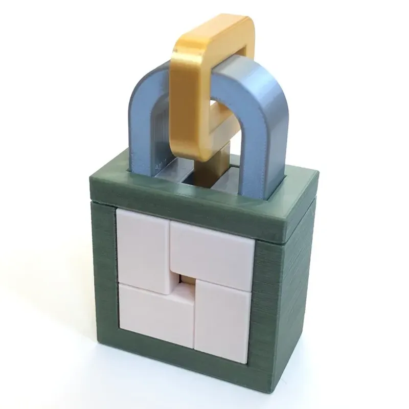 Key Maze - wood model traps a key until puzzle is solved