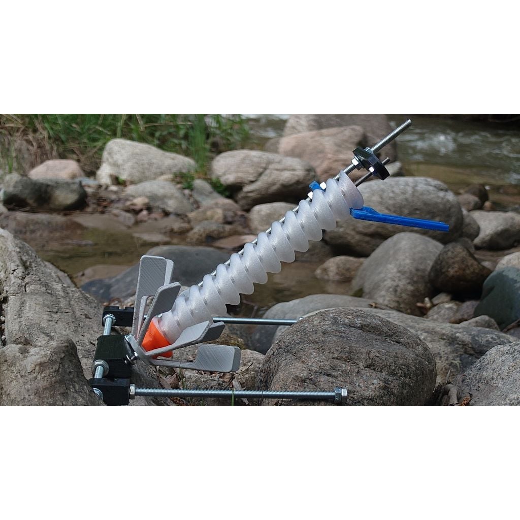 Archimedes' screw driven by water flow.