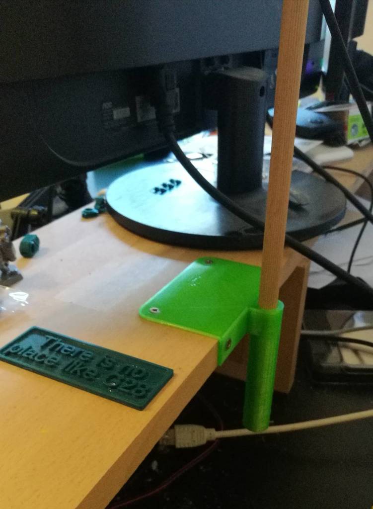 Table mount for holding rod for streaming light