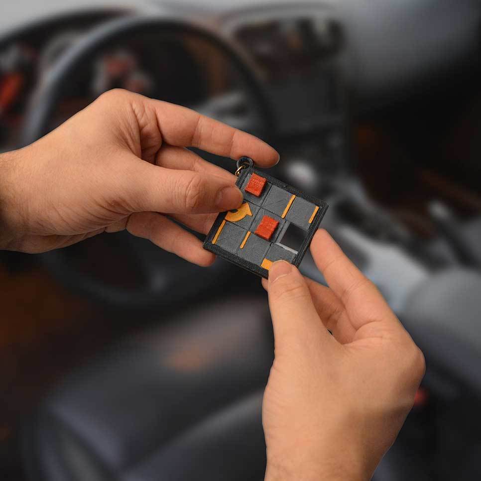 parking-lot-slide-puzzle-keychain-bring-awareness-to-responsible