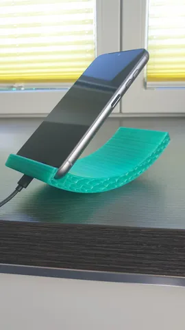 Customizable swinging phone holder