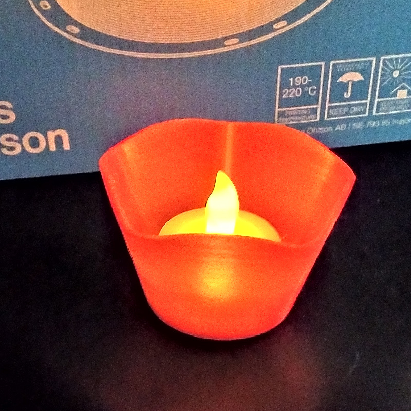 Wavy pentagonal LED tealight holder