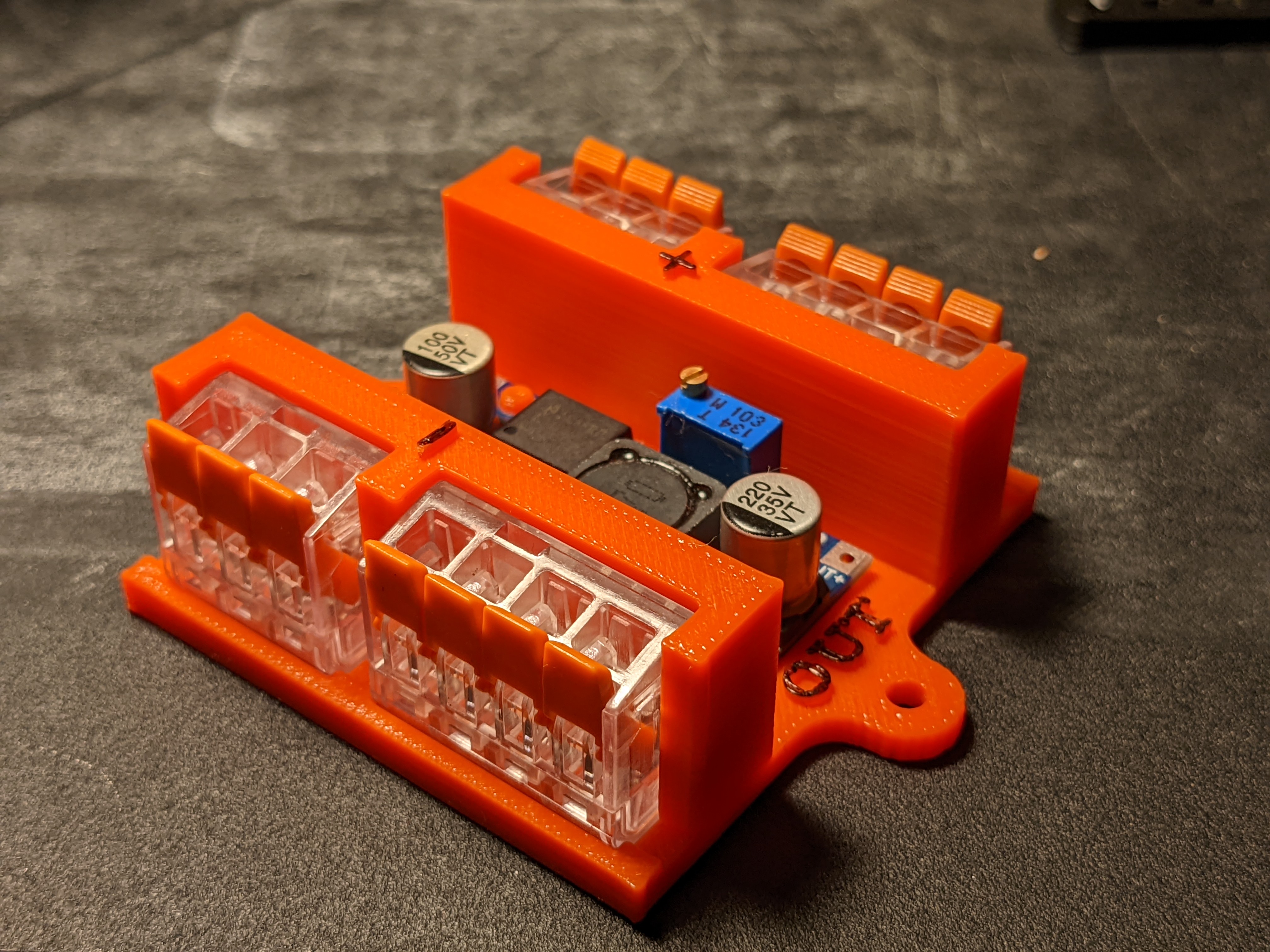 DC/DC buck converter mount with lever wire connectors