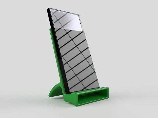 Phone stand with volume booster