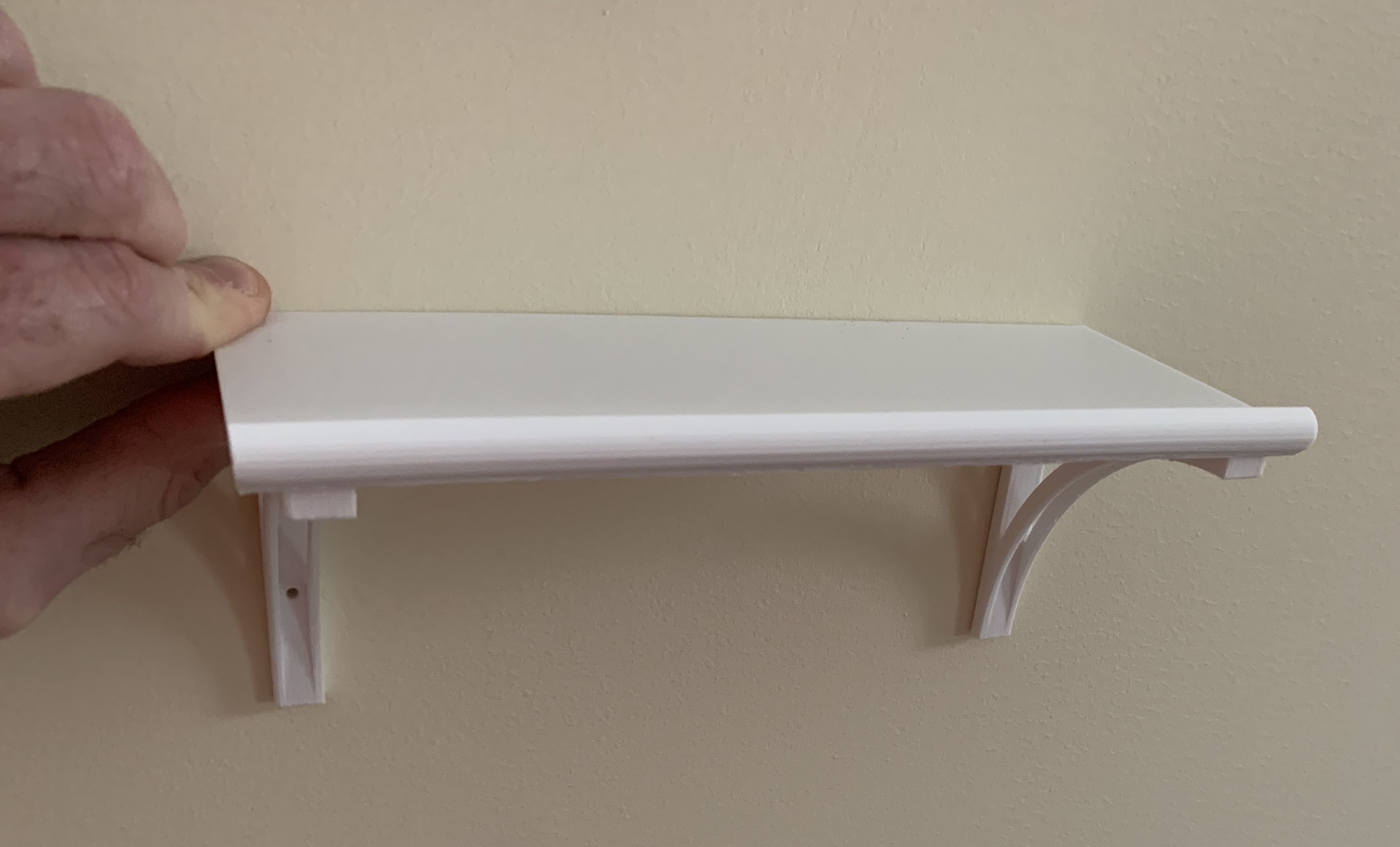 Micro shelf with bracket and lip