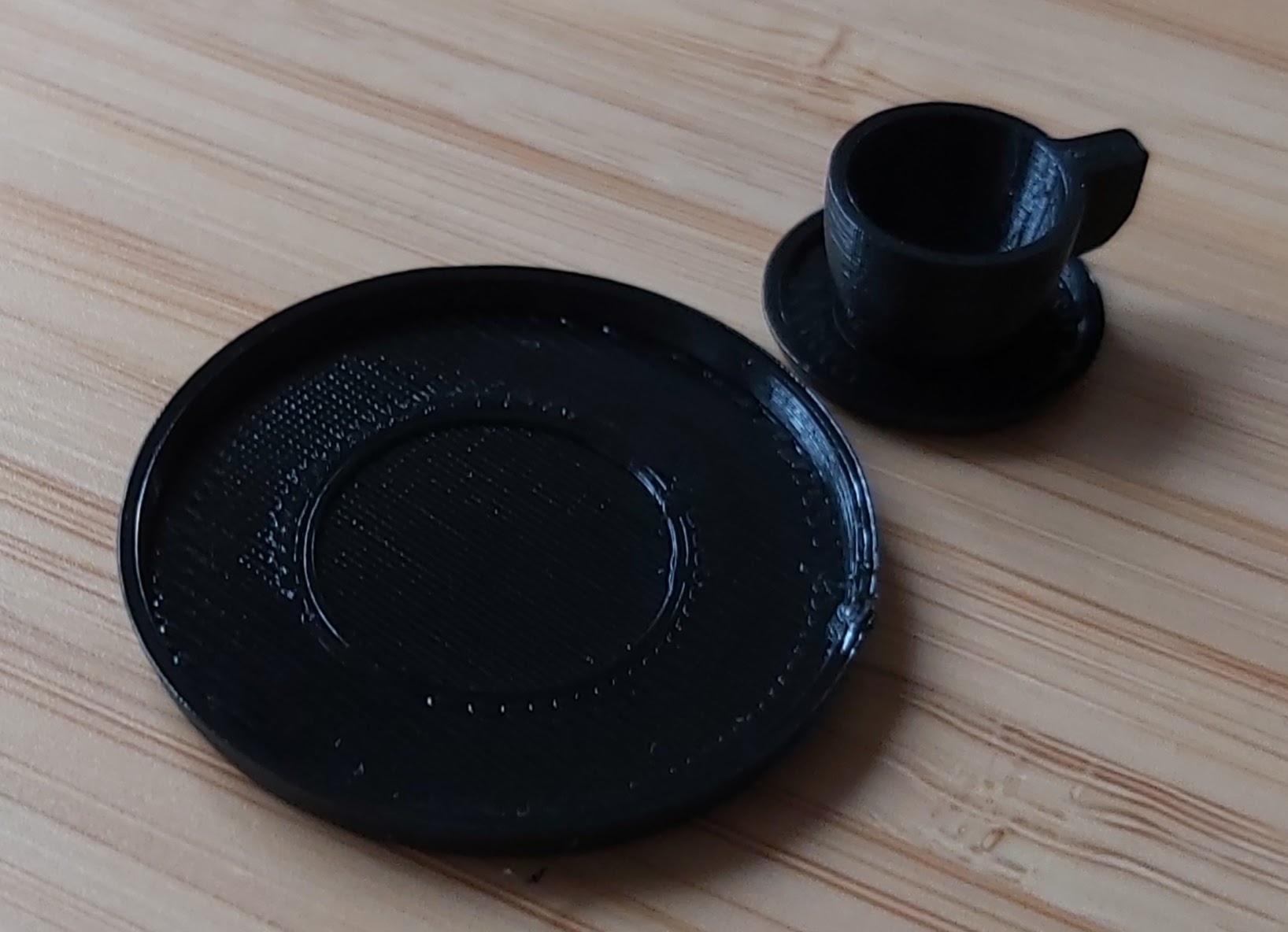 Table set for dollhouse: Cup, Saucer, and Plate