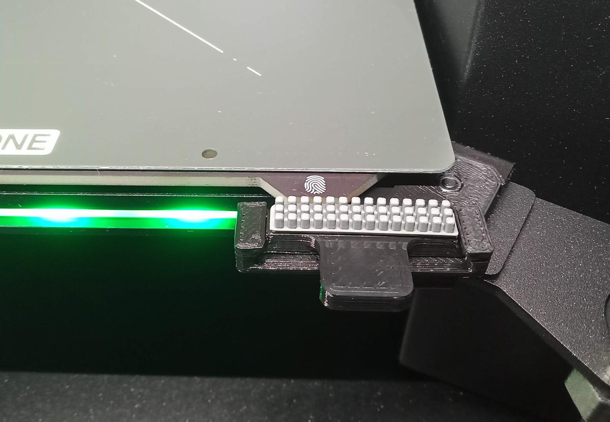Removable silicone brush holder for Prusa Core One