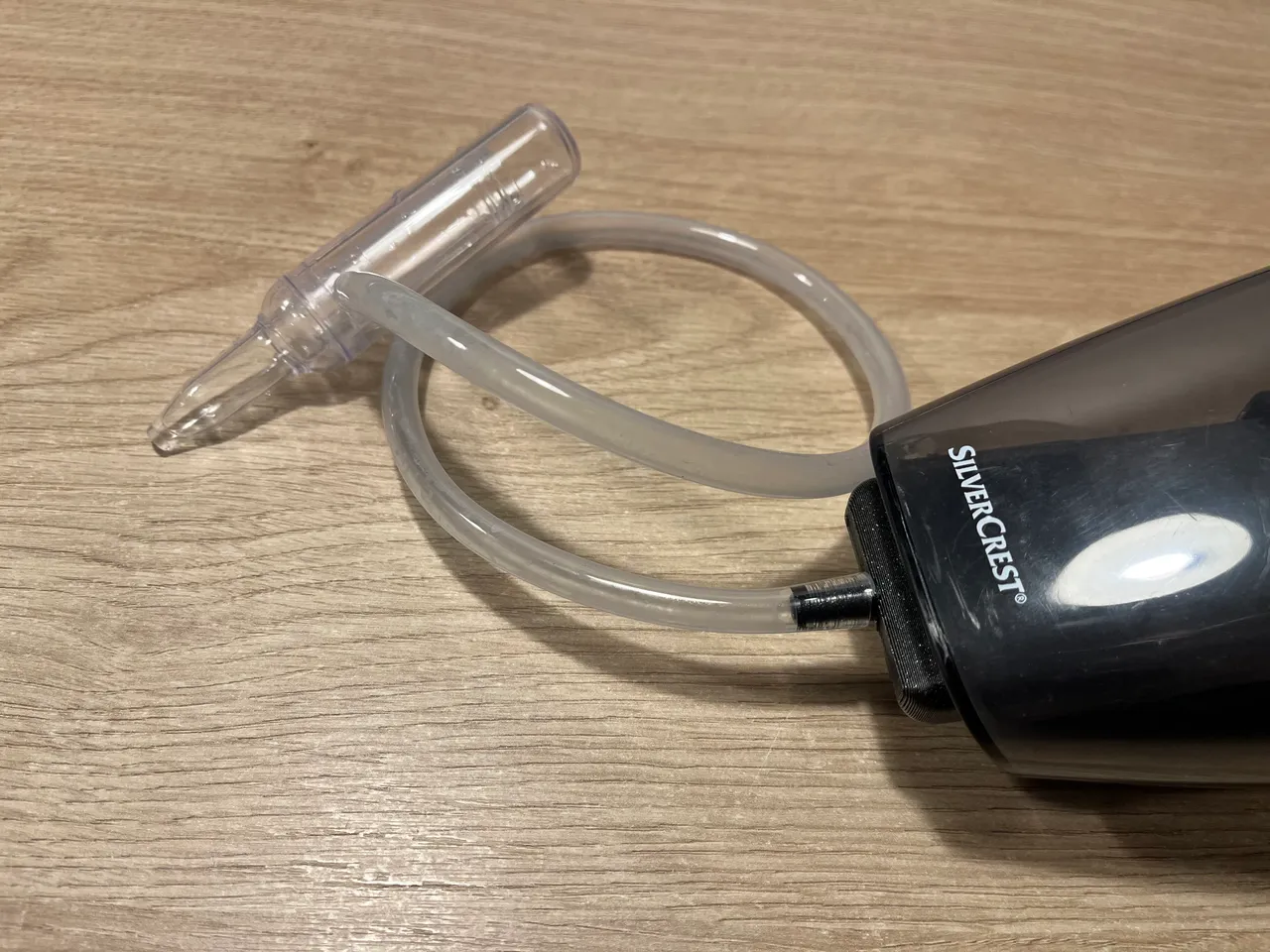 Nasal aspirator with vacuum cleaner adapter
