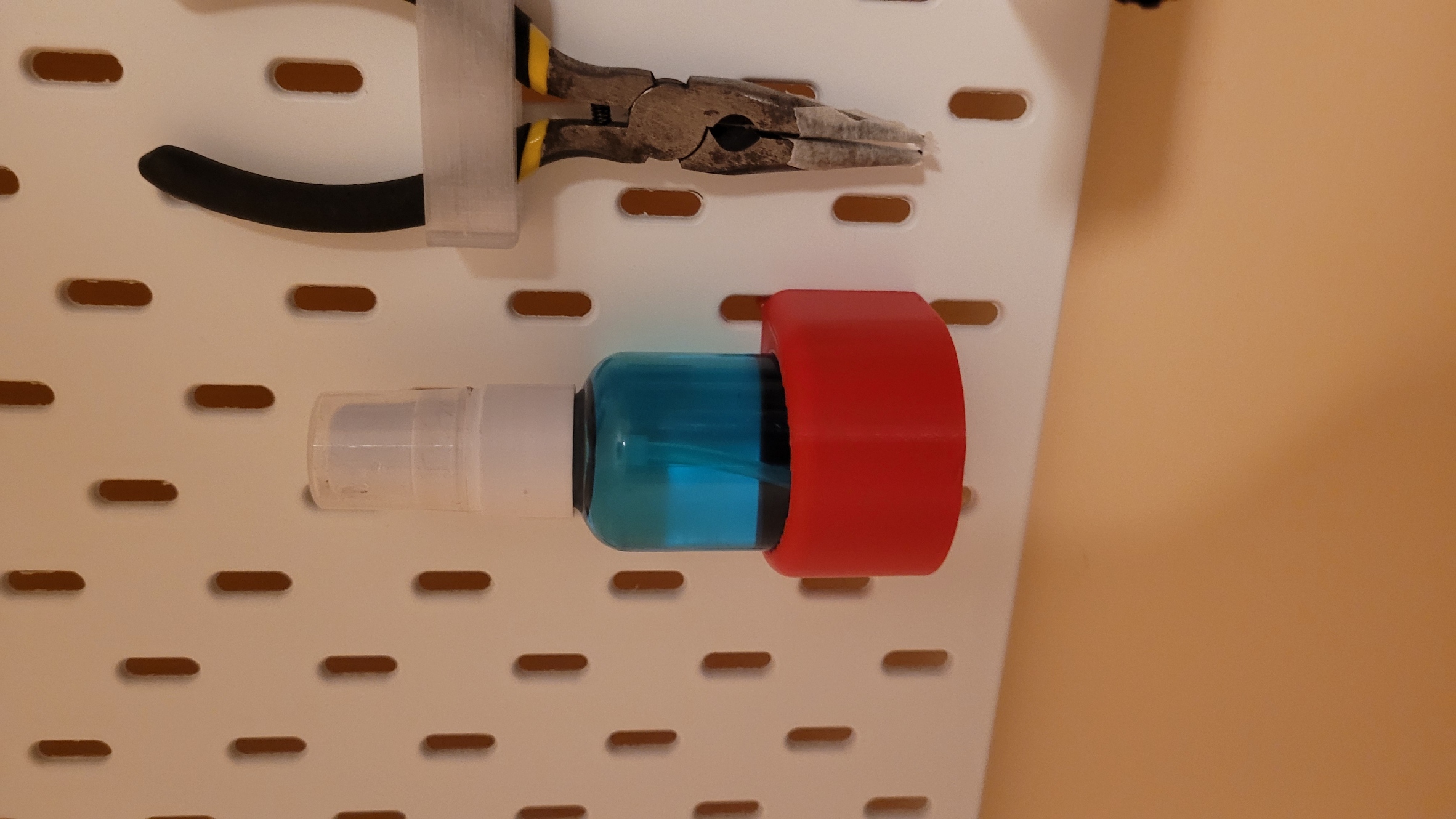 Ikea SKADIS bottle holder by ferferite Download free STL model