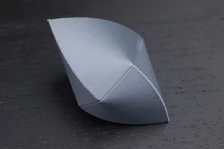 Three-cone sphericon