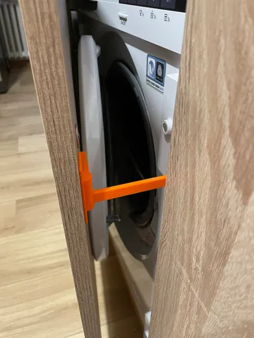 Door holder for built-in washing machine