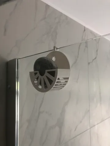 Round Shampoo holder for the shower