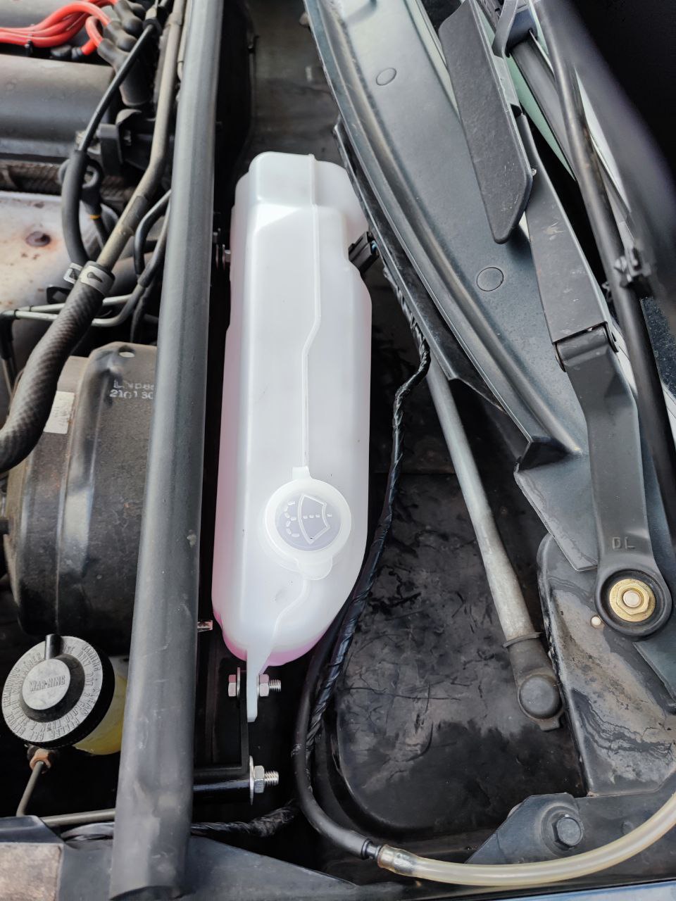 Brackets for Suzuki Cappuccino washer in Mazda Miata MX5