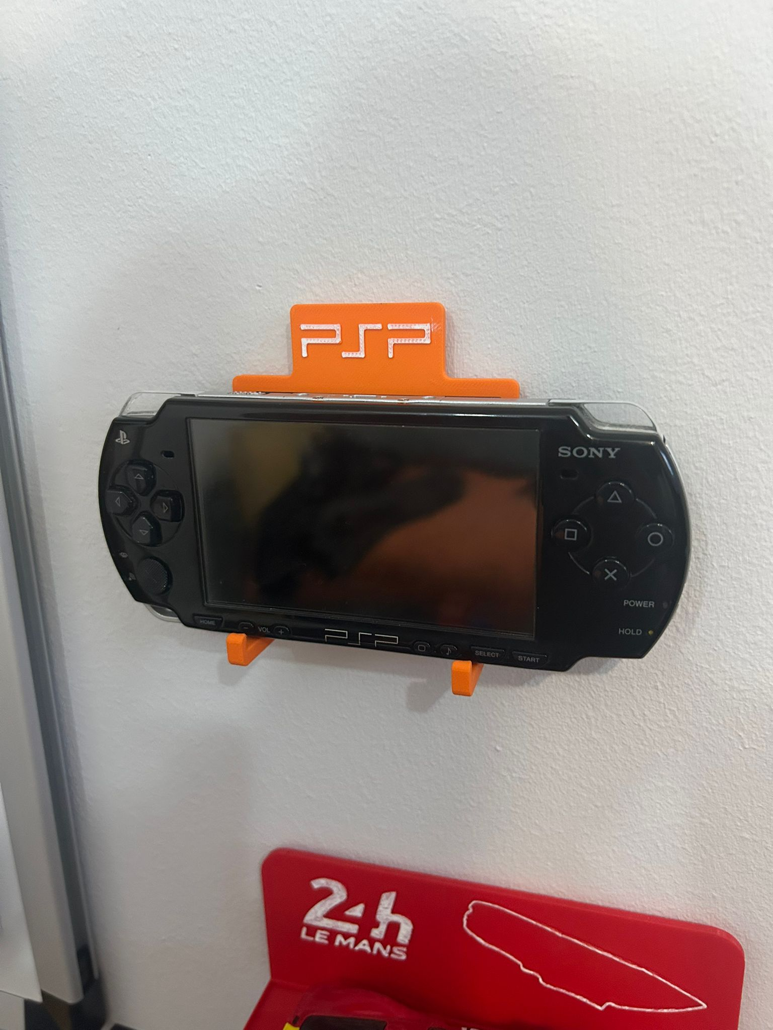 Soporte de pared para Sony PSP