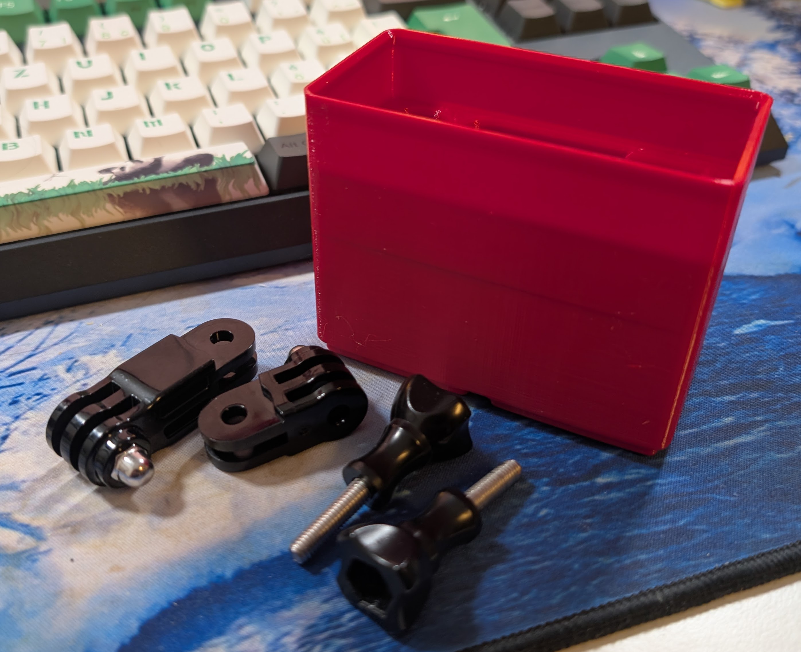 Gridfinity bin for GoPro adapter allowing to switch between landscape and portrait