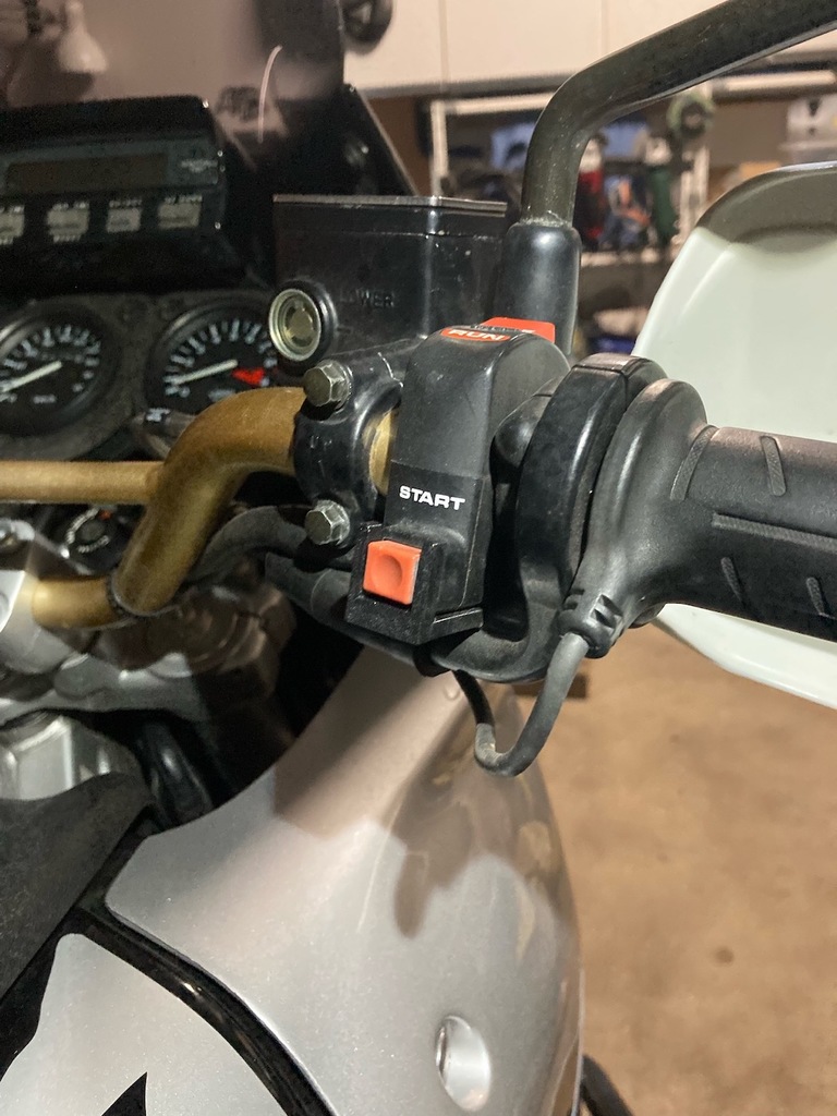 Starter button guard for Africa Twin XRV 750 RD07