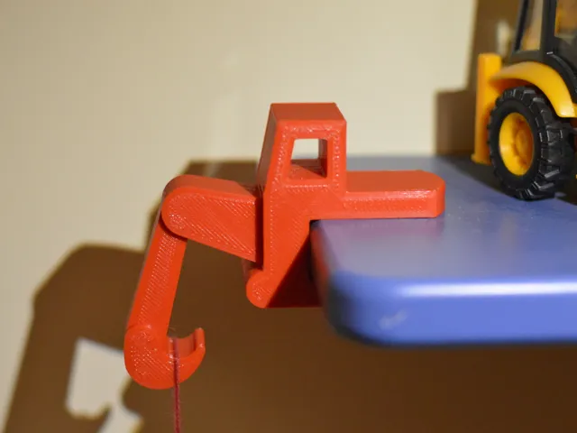 Digger-shaped shelf hook