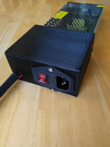 Power supply and switch cover