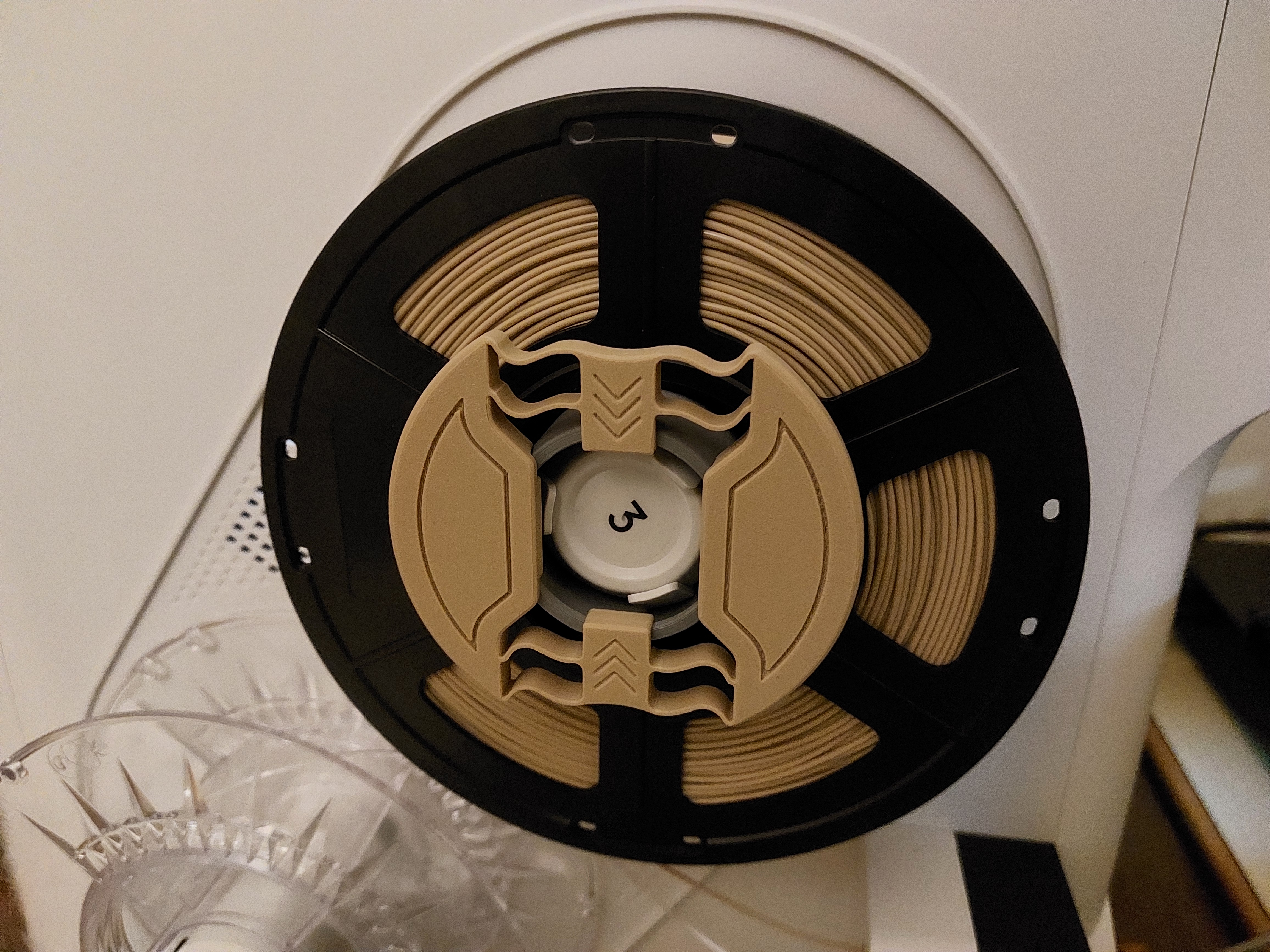 Filament roll adapter for rolls with all hole diamteres
