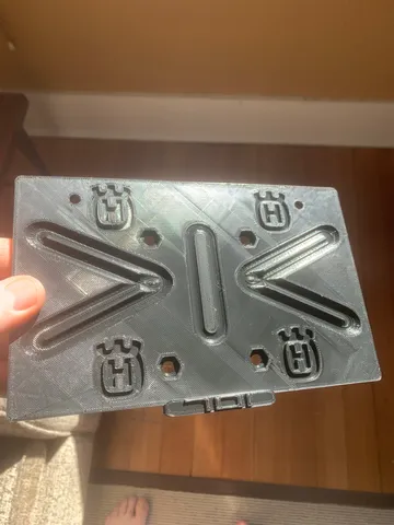 Husqvarna 701 plate holder