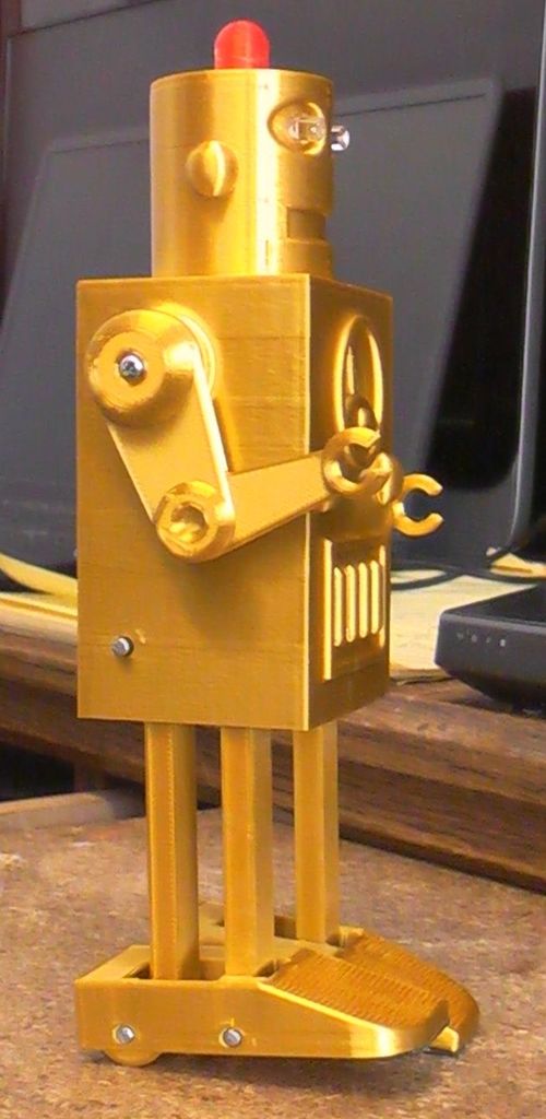 Heel - Toe walking robot with swinging arms.