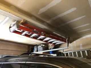 Louisville ladder leg holder