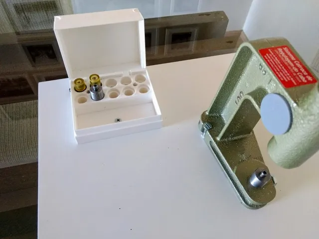Box for dies for grommet machine
