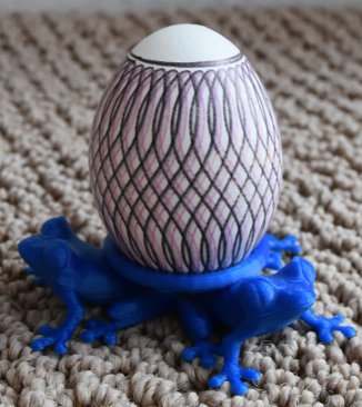 Miniatura 18 do modelo 3D Easter Egg Holder - Group 5 (OpenSCAD)