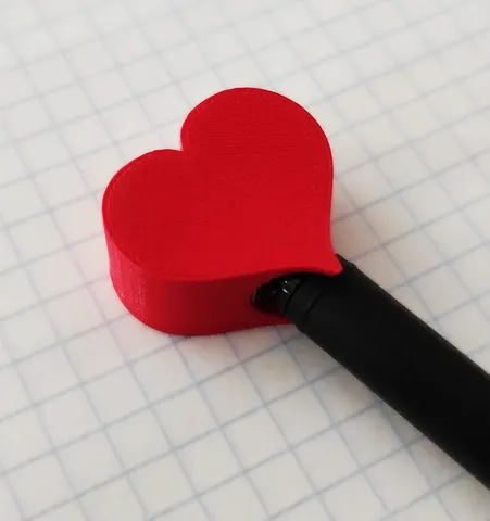 Heart top for a spinning pen