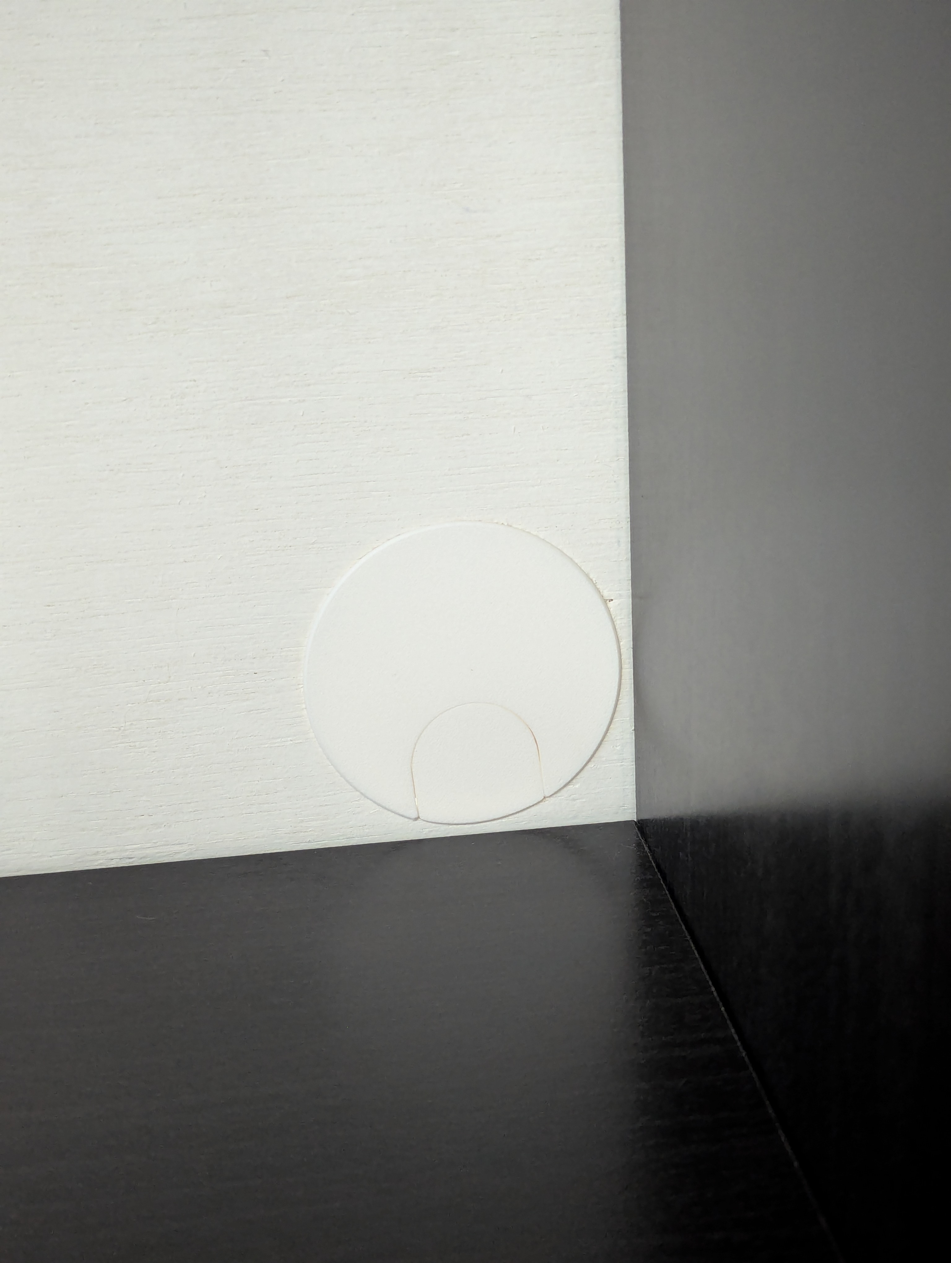 Furniture breakaway wire hole cap