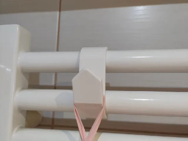Radiator towel hook