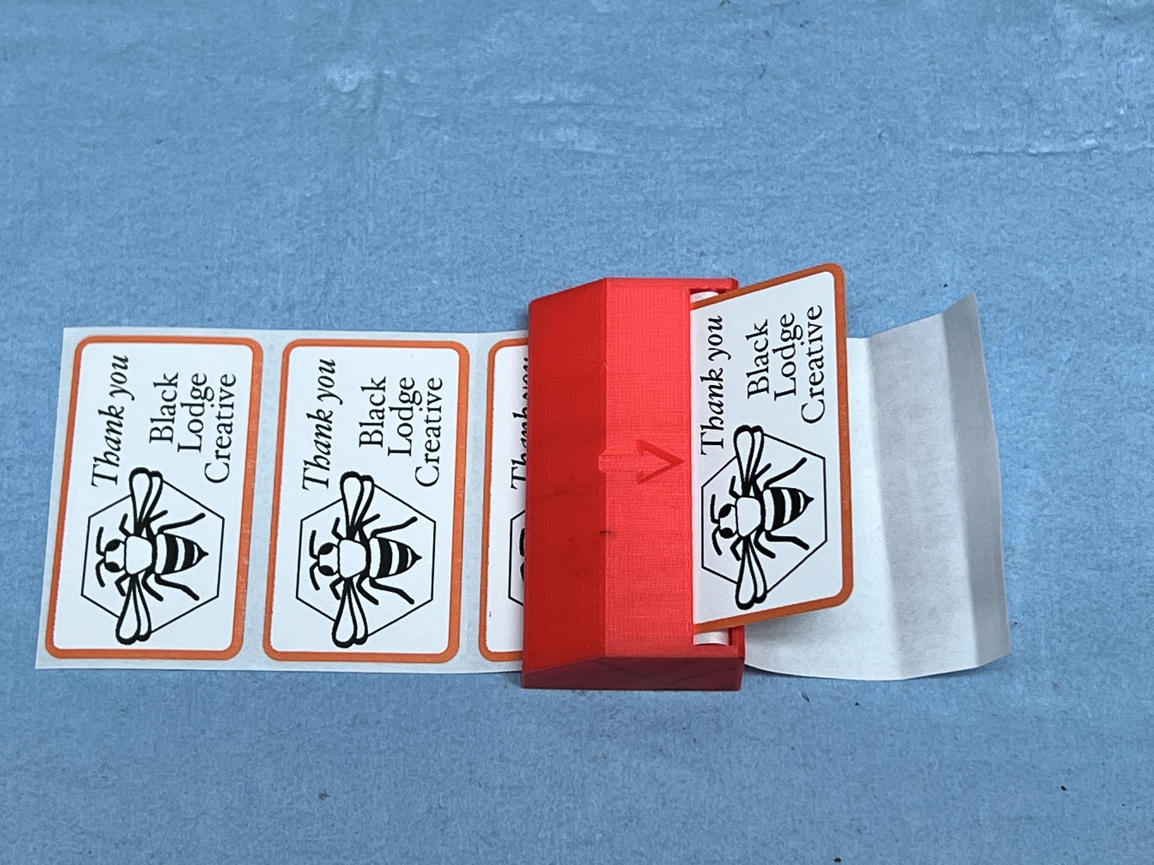 Simple sticker dispenser - 61.5mm (2.25 inch)