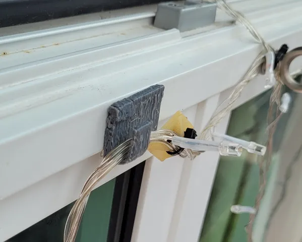 Cable clip with wide base