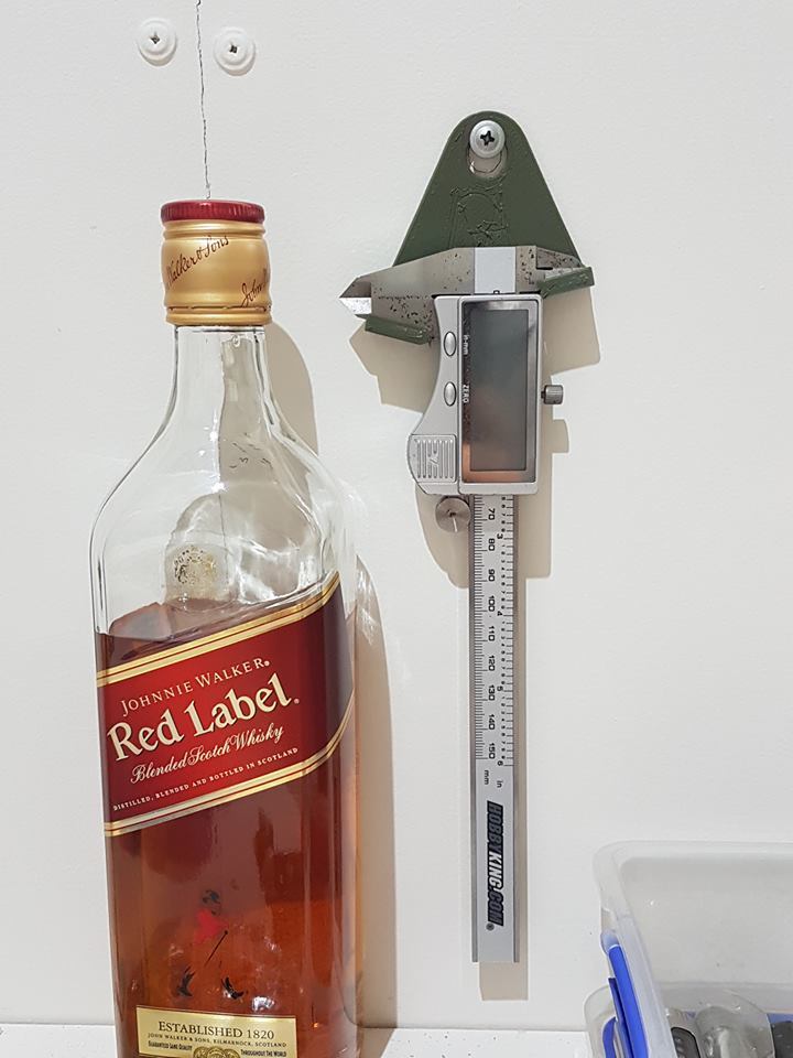 UNIVERSAL HANGING CALIPER HOLDER