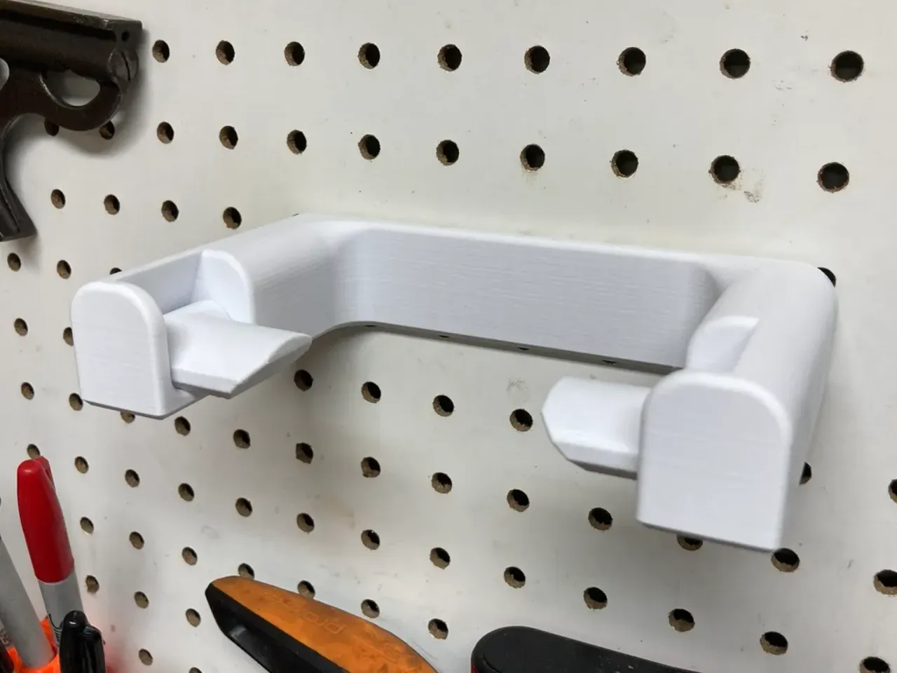 Toilet paper roll holder for pegboard by cmh