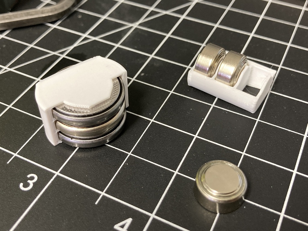 Minimal coin cell battery holders
