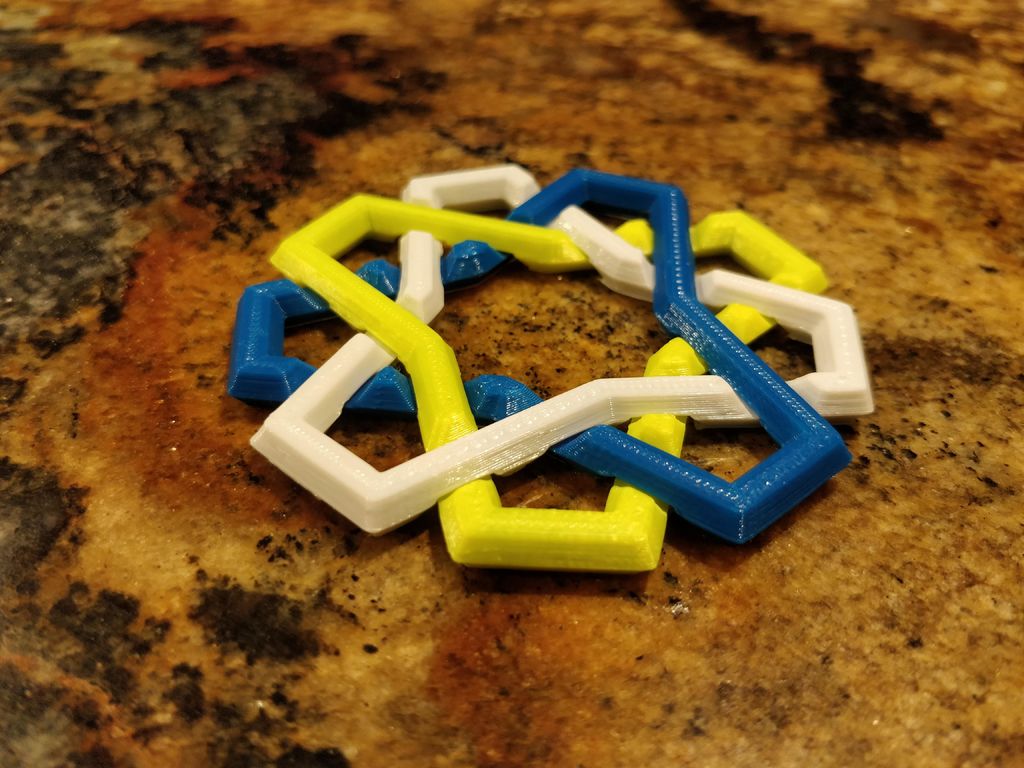 Multi-Material Interlocking Rings Puzzle