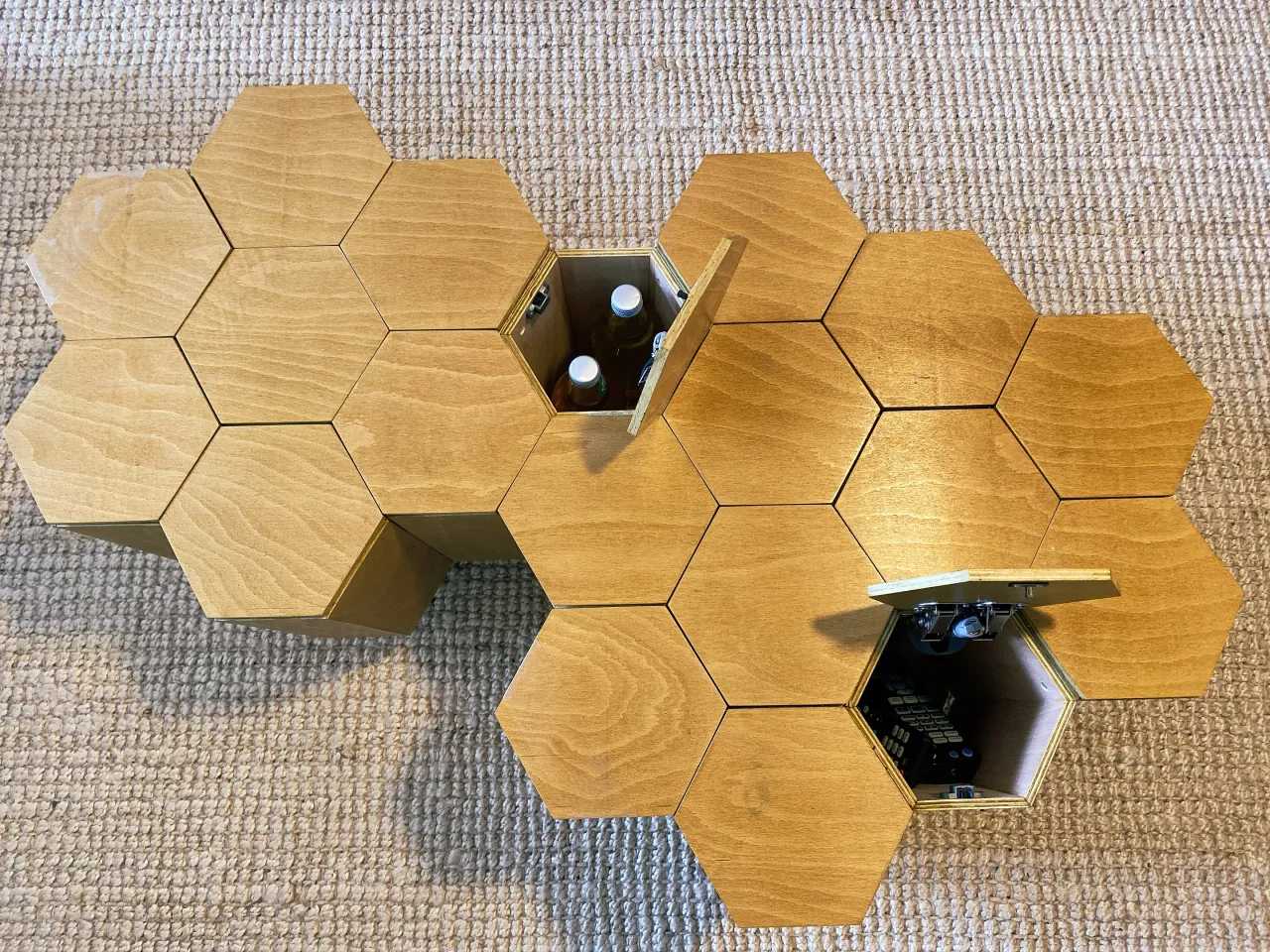Modular honeycomb coffee table with built-in storage and pop-up