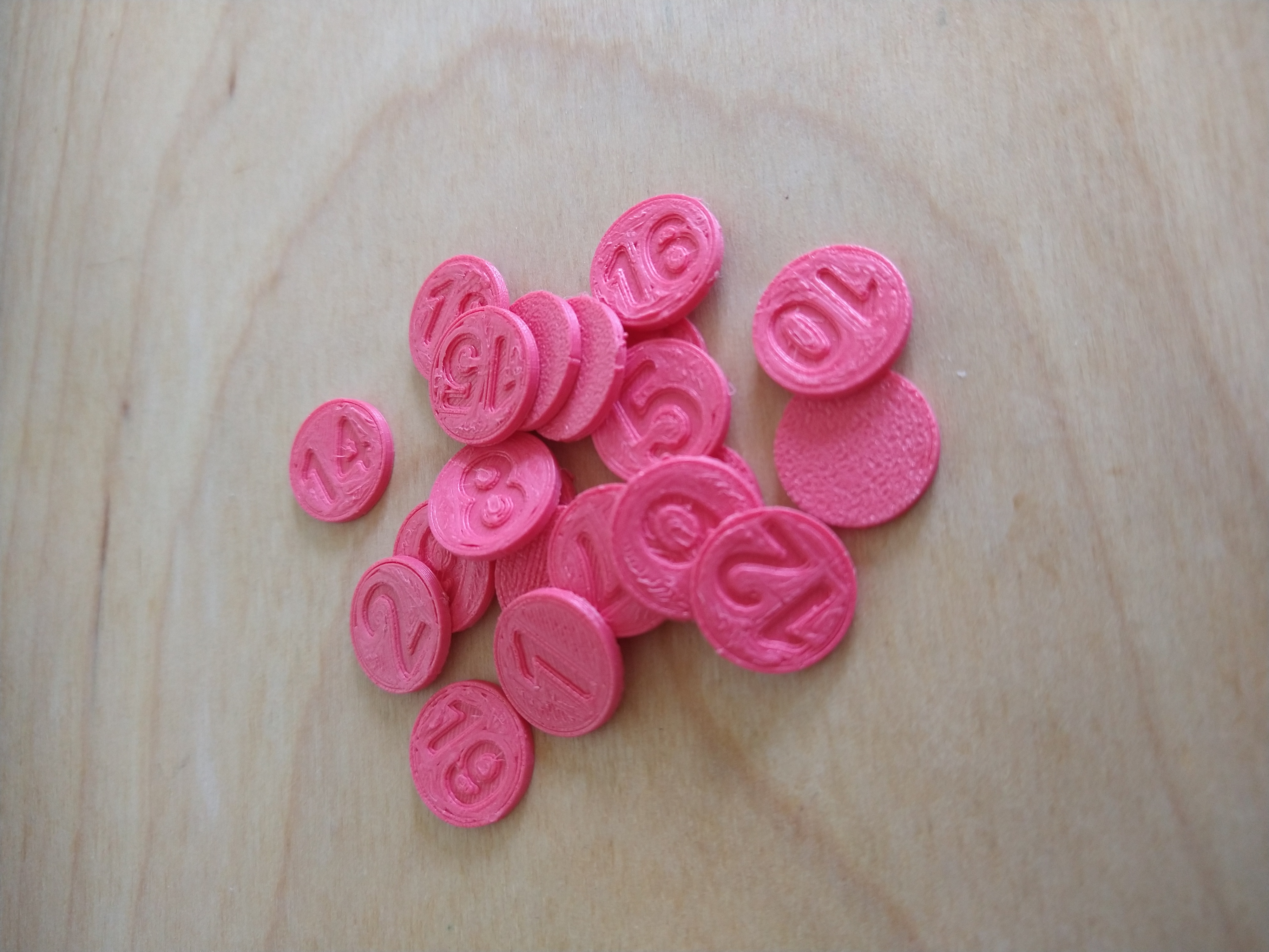 Small numbered tokens 1-20