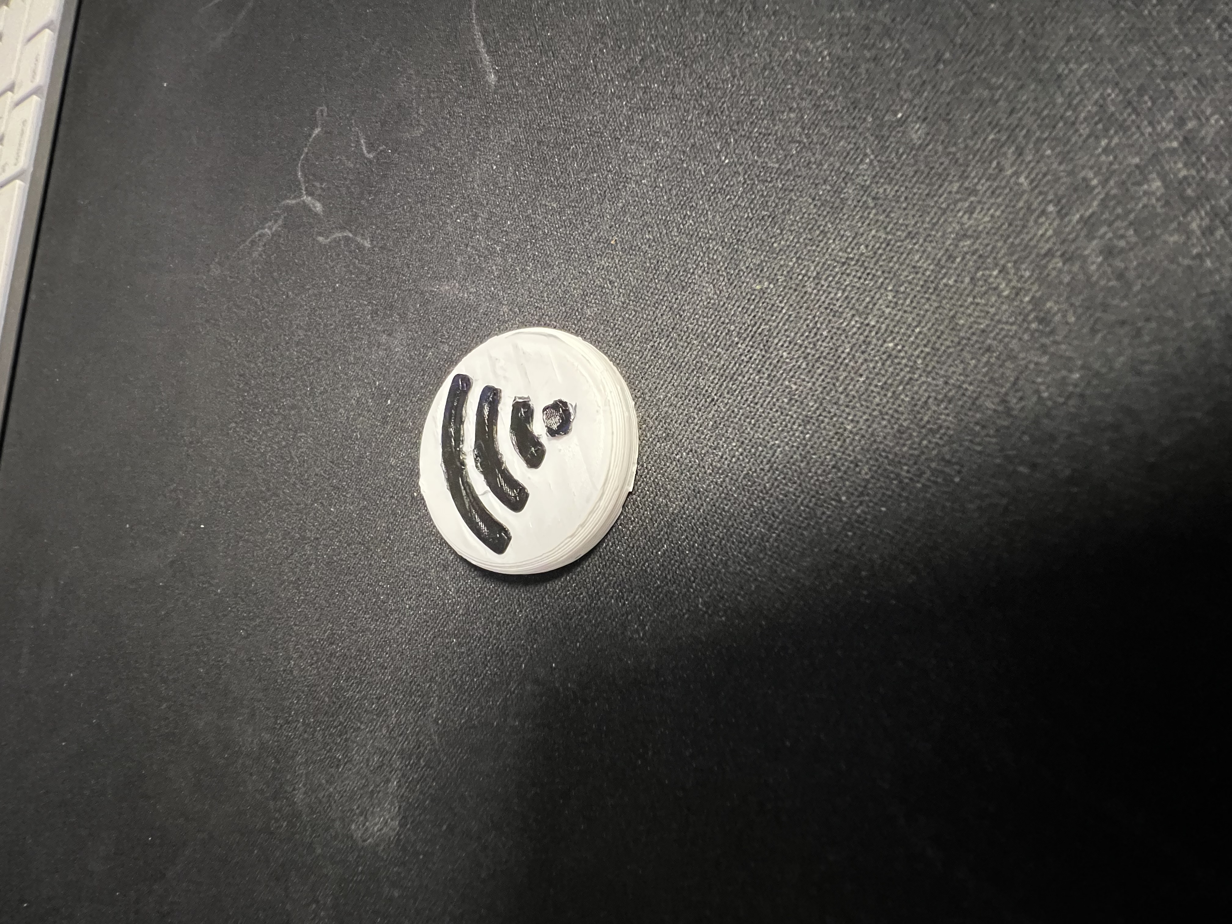 Embossed WiFi NFC pairing button