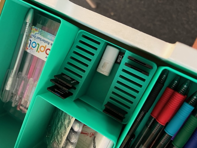 Drawer organiser with built in SD card storage