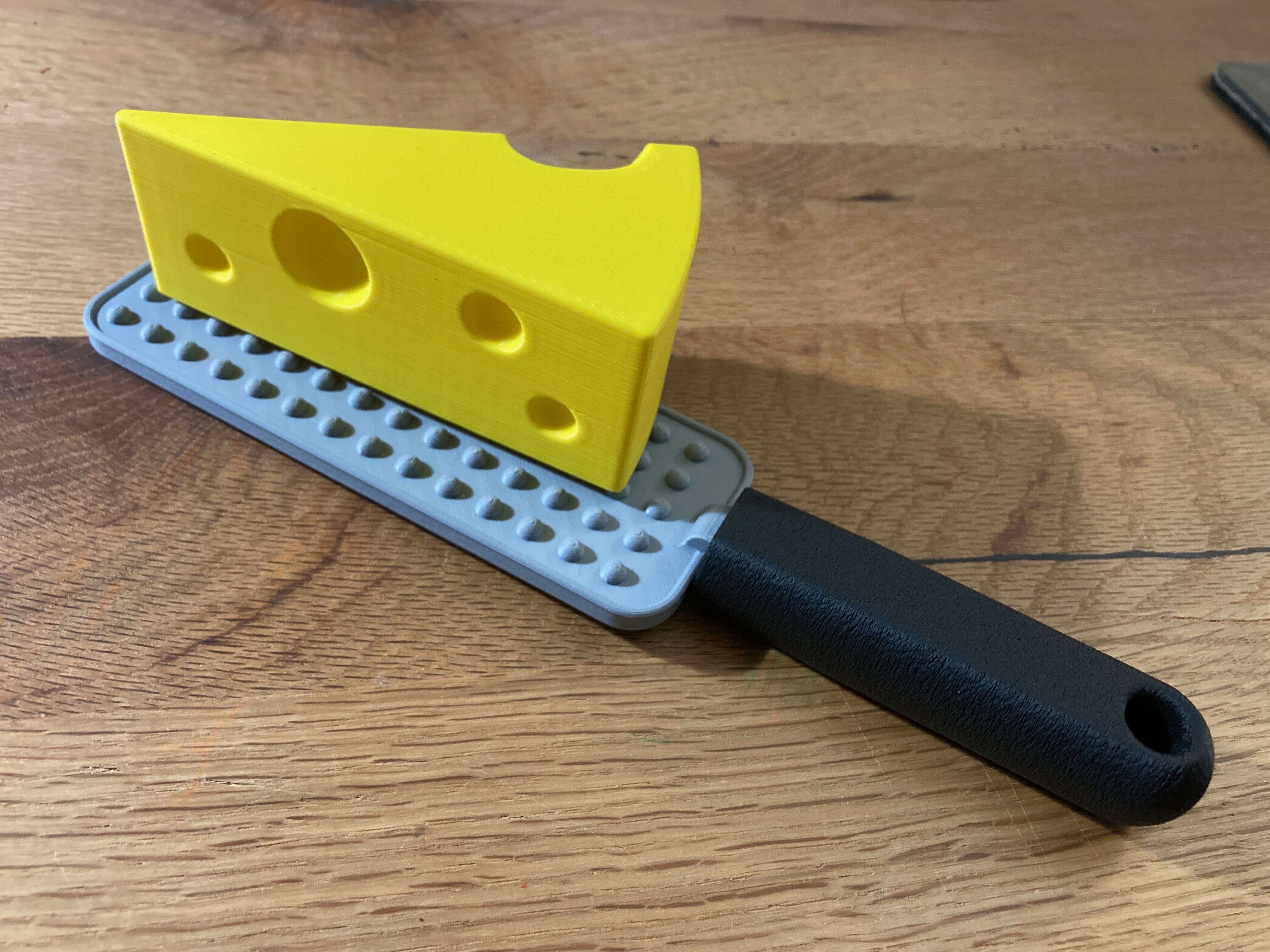 Käsereibe  / cheese grater