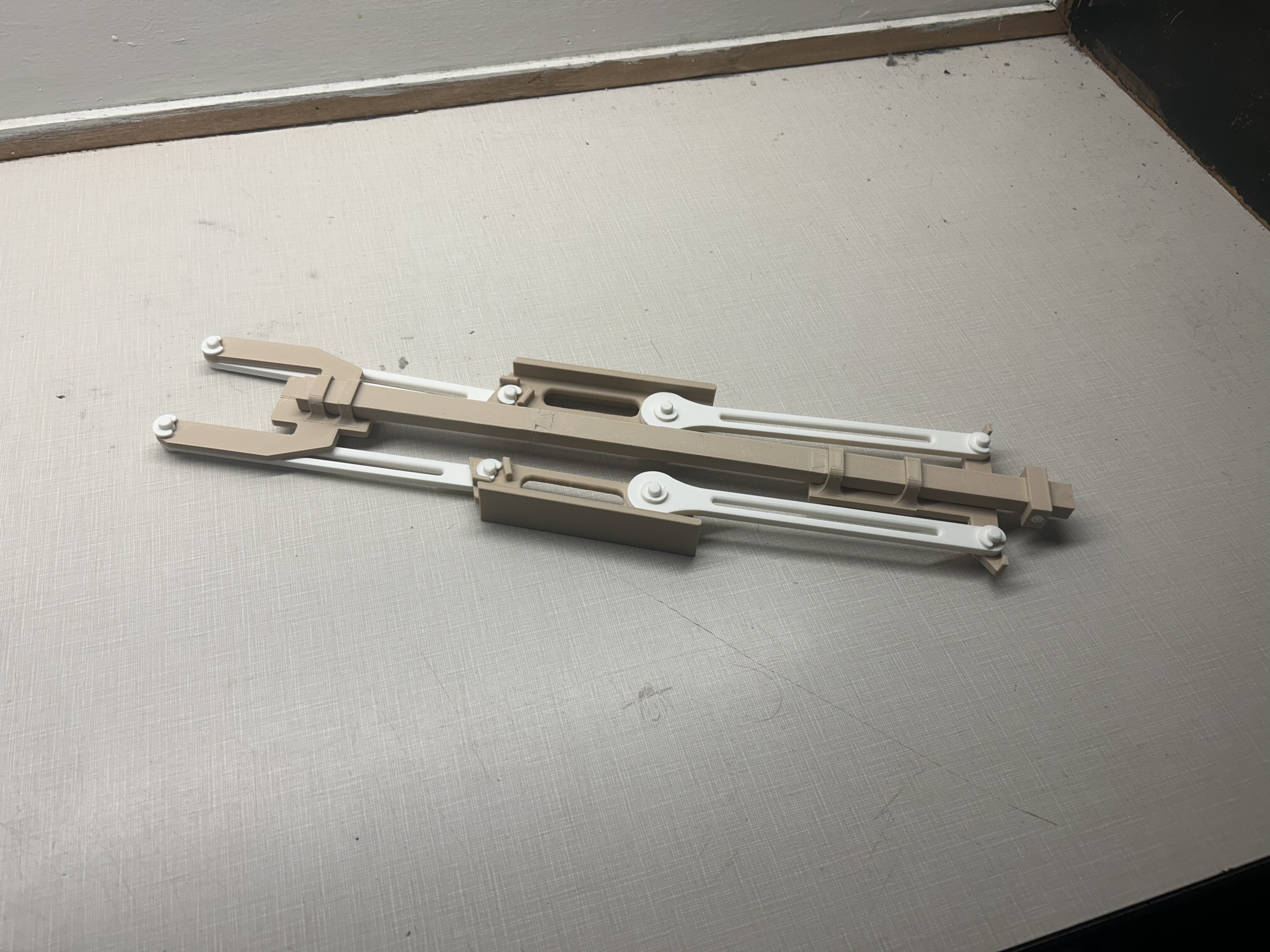 Unika's Folding crossbow like mechanism