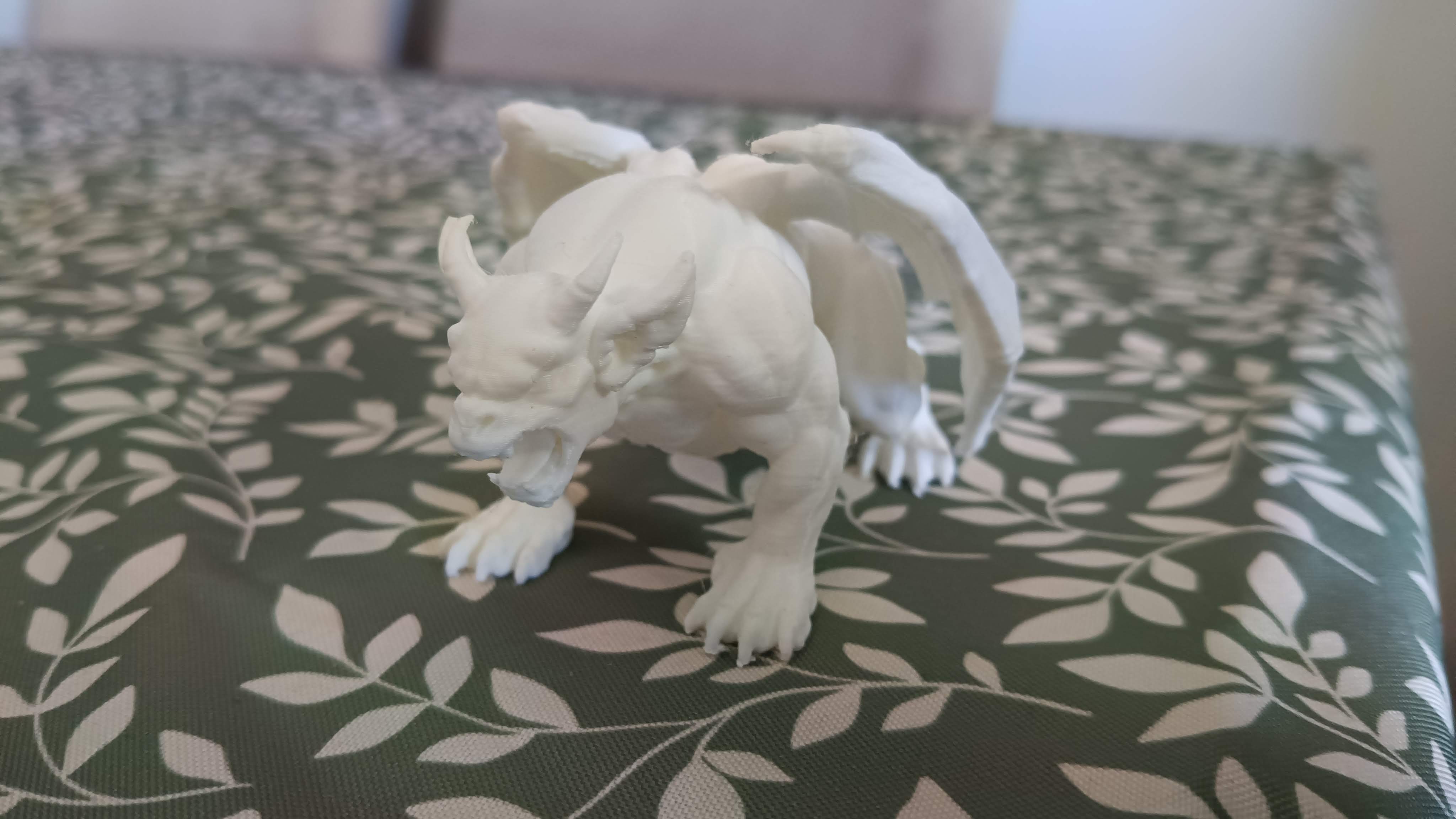 Gargoyle on it's four roaring