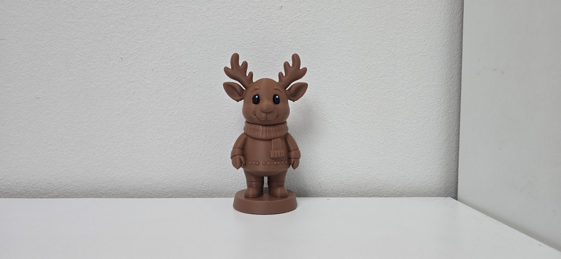 Reindeer in Sweater and Scarf Christmas Figure