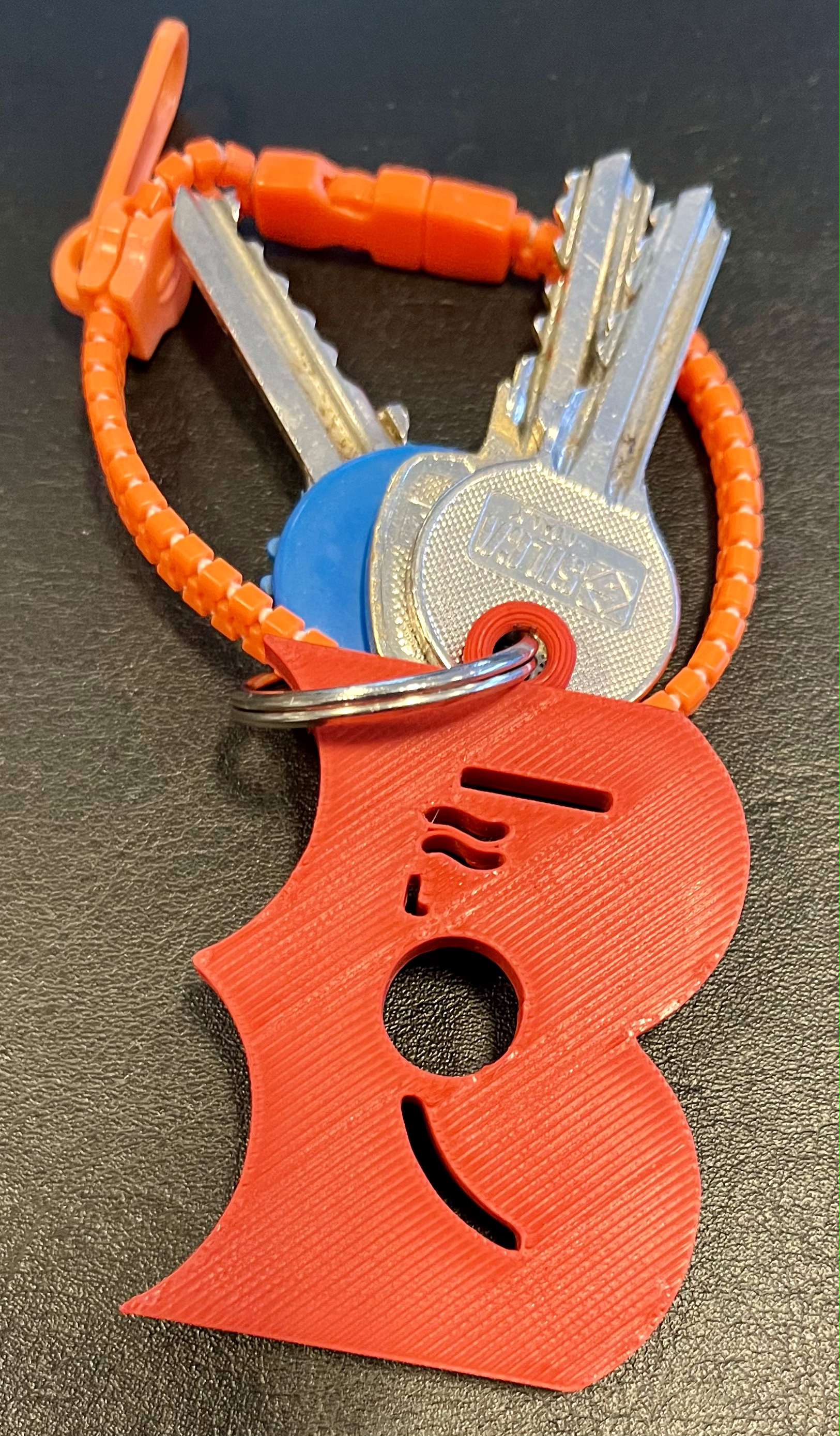 Warsaw Libraries logo keychain